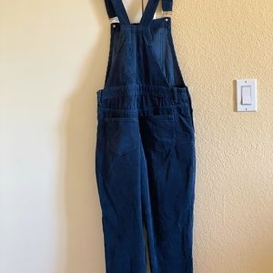 Blue jumpsuit/romper size xs still good condition only use twice .